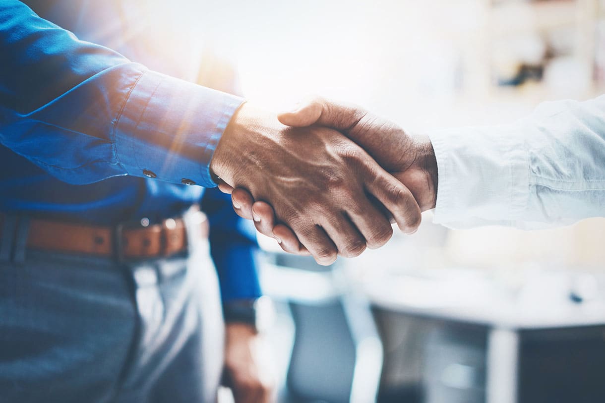 Handshake between two people