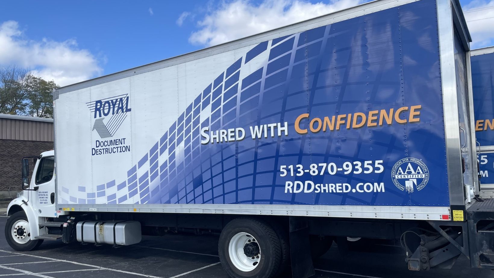 A Royal Document Destruction shredding truck parked in a parking lot