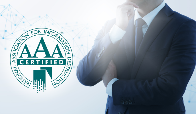 Business man with a NAID logo beside