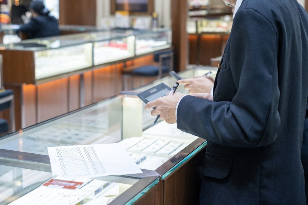 retail worker going over documents